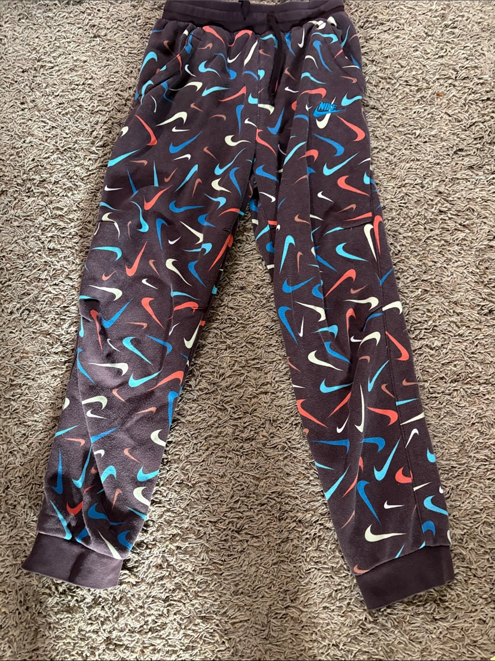 Nike Black Sweatpants with Multicolor Swoosh Print